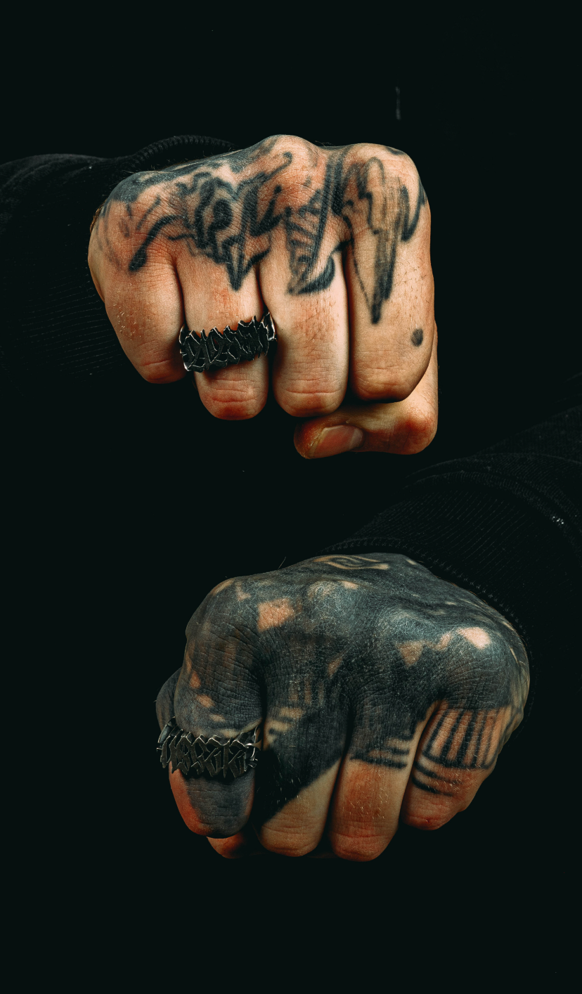 Close-up portraits of tattooed hands