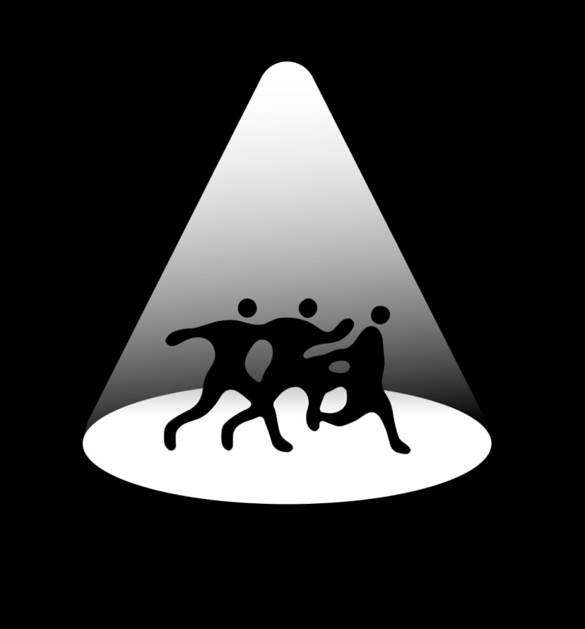 Figures beneath a triangular spotlight